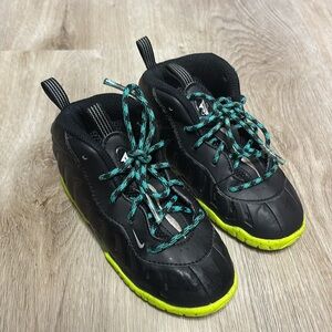 Nike Kids Black Sneakers with Neon Yellow Soles and Teal Laces